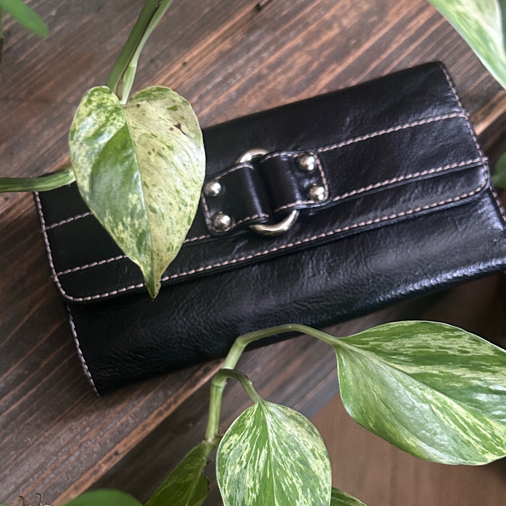 Wilson’s Black Leather Wallet with Silver Accents